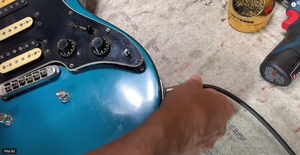 FIX a Buzzing Guitar Output Jack - 1 Minute Scratchy Noise Repair